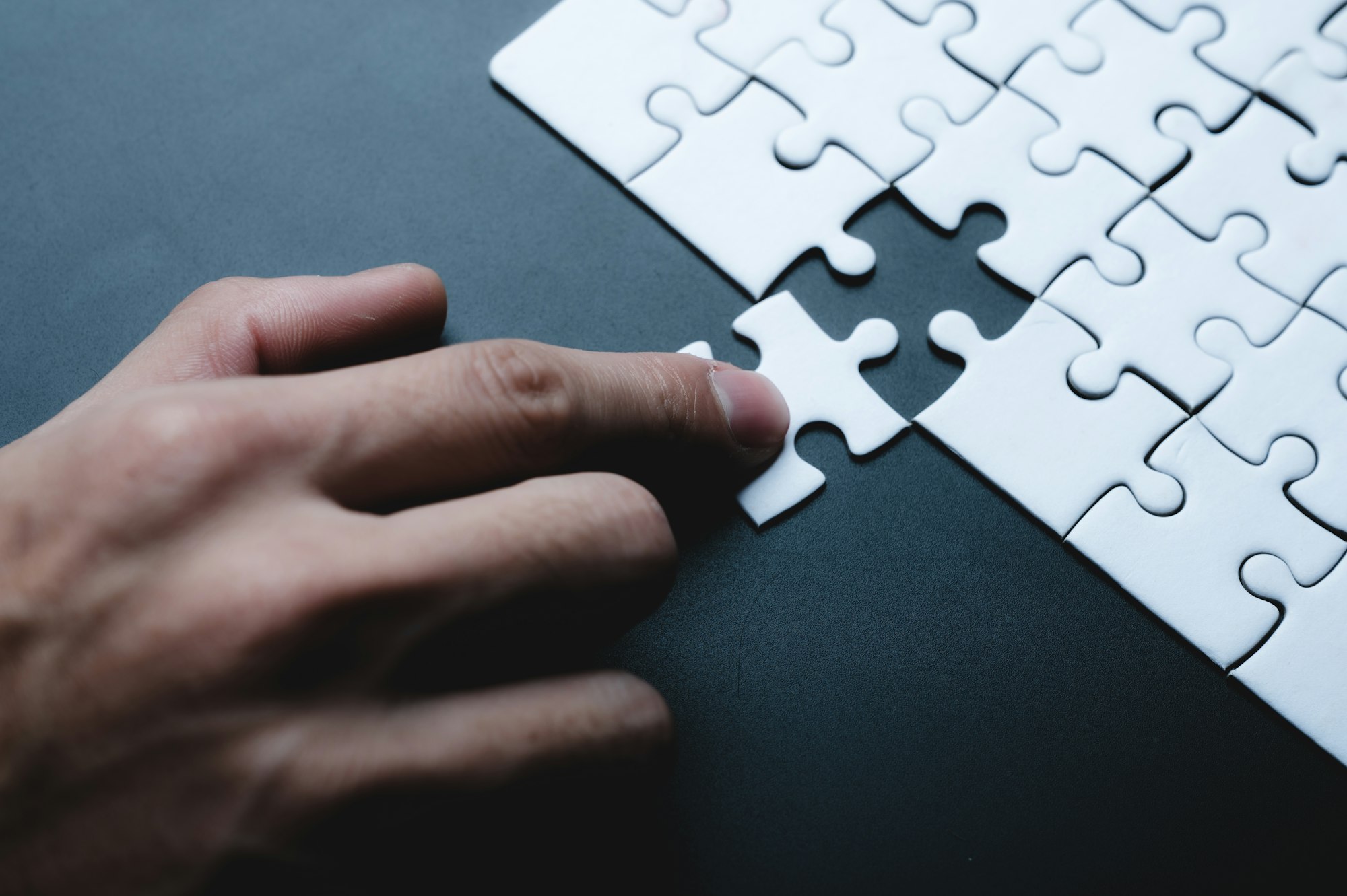 business success concept idea of jigsaw puzzle, teamwork solution and join connection